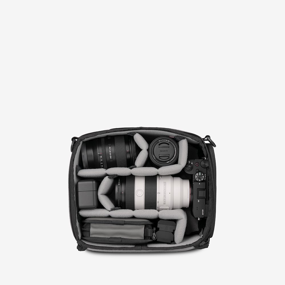 WANDRD Essential Camera Cube V2 interior packed with camera gear