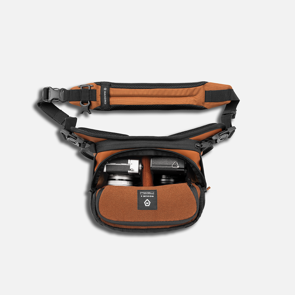 WANDRD ROGUE Sling 4L V2 in Sedona Orange, camera pack out