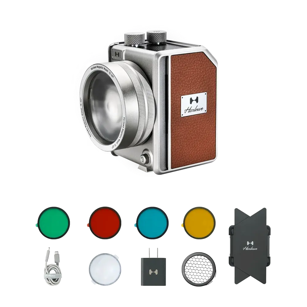 Harlowe Mini II 20W bi-color light kit, silver body, brown leather, with gels, dome, charger, mount.