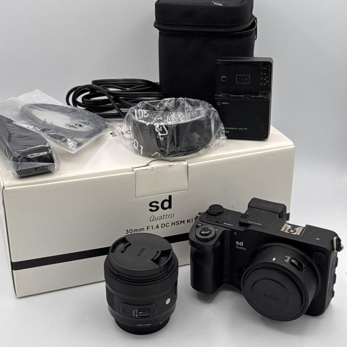 Used Sigma sd Quattro with 30mm F1.4 DC HSM & 12-24 F4.5-5.6 II DG Camera