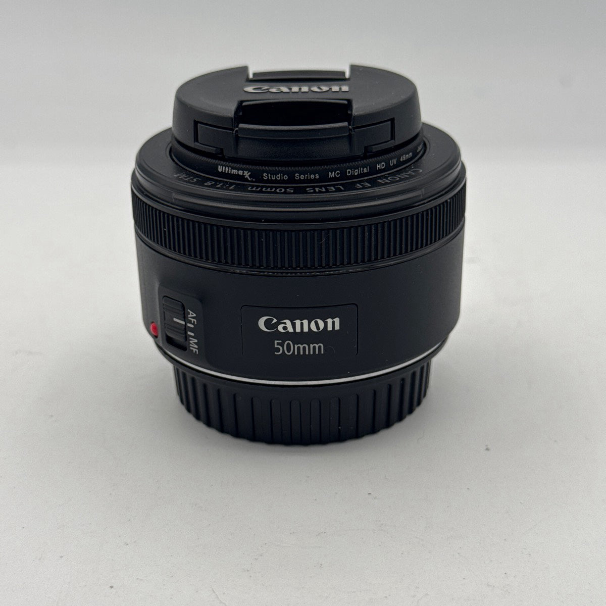 Used Canon EF 50mm f/1.8 STM with UV Filter Lens
