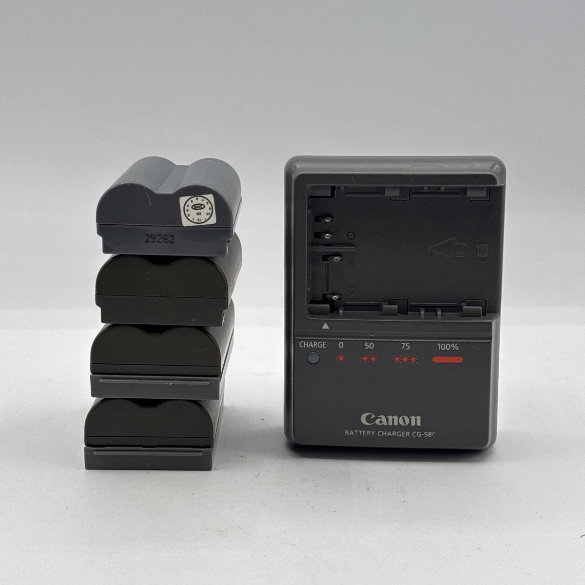 Used Canon Battery Charger CG-580 with BP-511 batteries