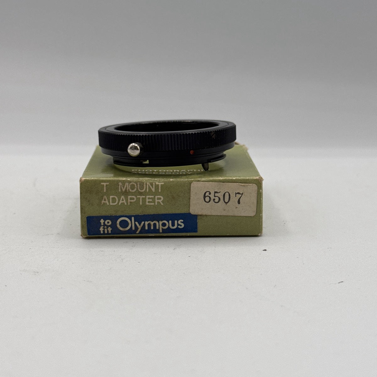 Used T Mount to Olympus OM Lens Adapter