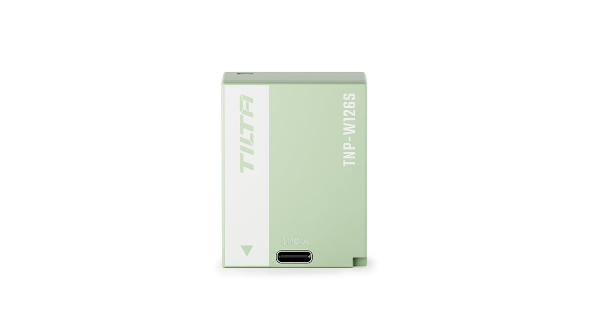 Tilta TNP-W126S battery in Ash Green, straight-on front view showing the USB-C input port and Tilta branding