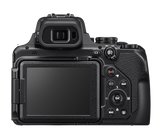 Nikon COOLPIX P1100 rear view showing 3.2-inch vari-angle LCD and OLED electronic viewfinder