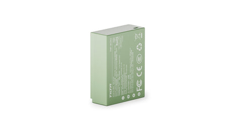 Tilta TNP-W126S battery in Ash Green, rear three-quarter view showing the printed specifications and safety certification markings
