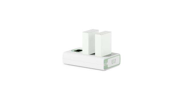 Tilta TBC-E17-AG two-channel LP-E17 battery charger in Ash Green with two LP-E17 batteries seated in both channels