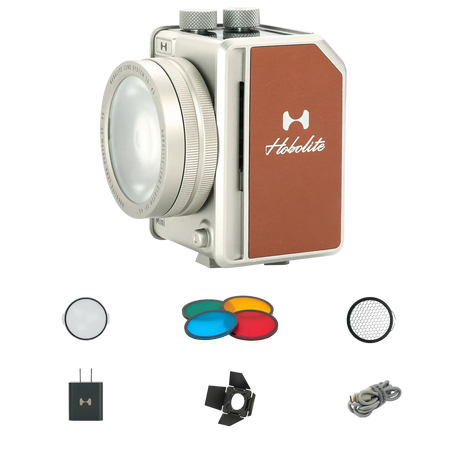 Hobolite Mini 20W portable LED light with diffuser, color gels, honeycomb grid, barn doors, power adapter and cable.