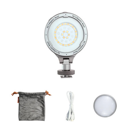 Harlowe Sol 5 Spectra RGBCW portable LED light with magnetic mount, gray pouch, white charging cable, and diffuser.