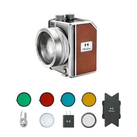 Harlowe Mini II 20W bi-color light kit, silver body, brown leather, with gels, dome, charger, mount.