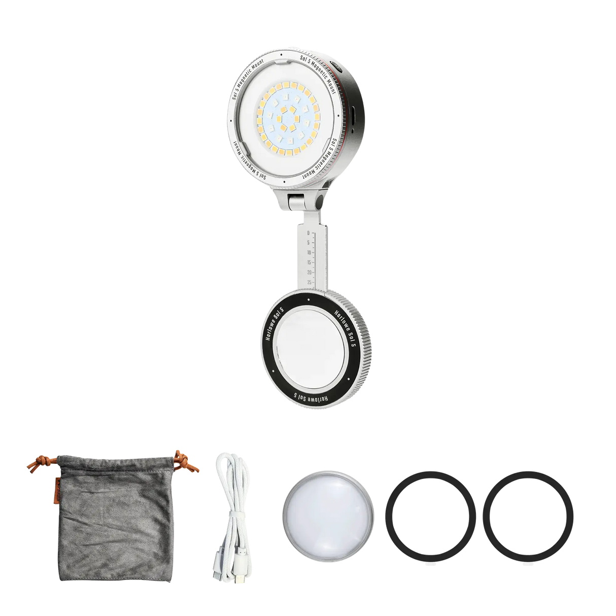 Harlowe Sol 5 Spectra RGBCW light w/ MagSafe. Includes charging cable, pouch, diffuser, and rings.