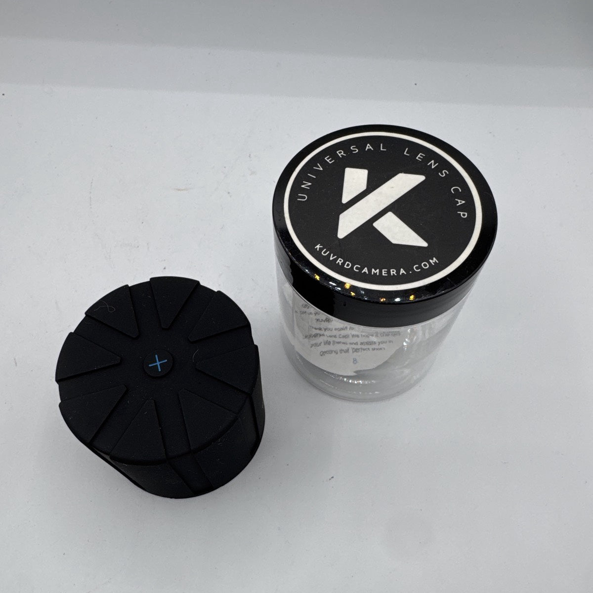Used KUVRD Universal Lens Cap