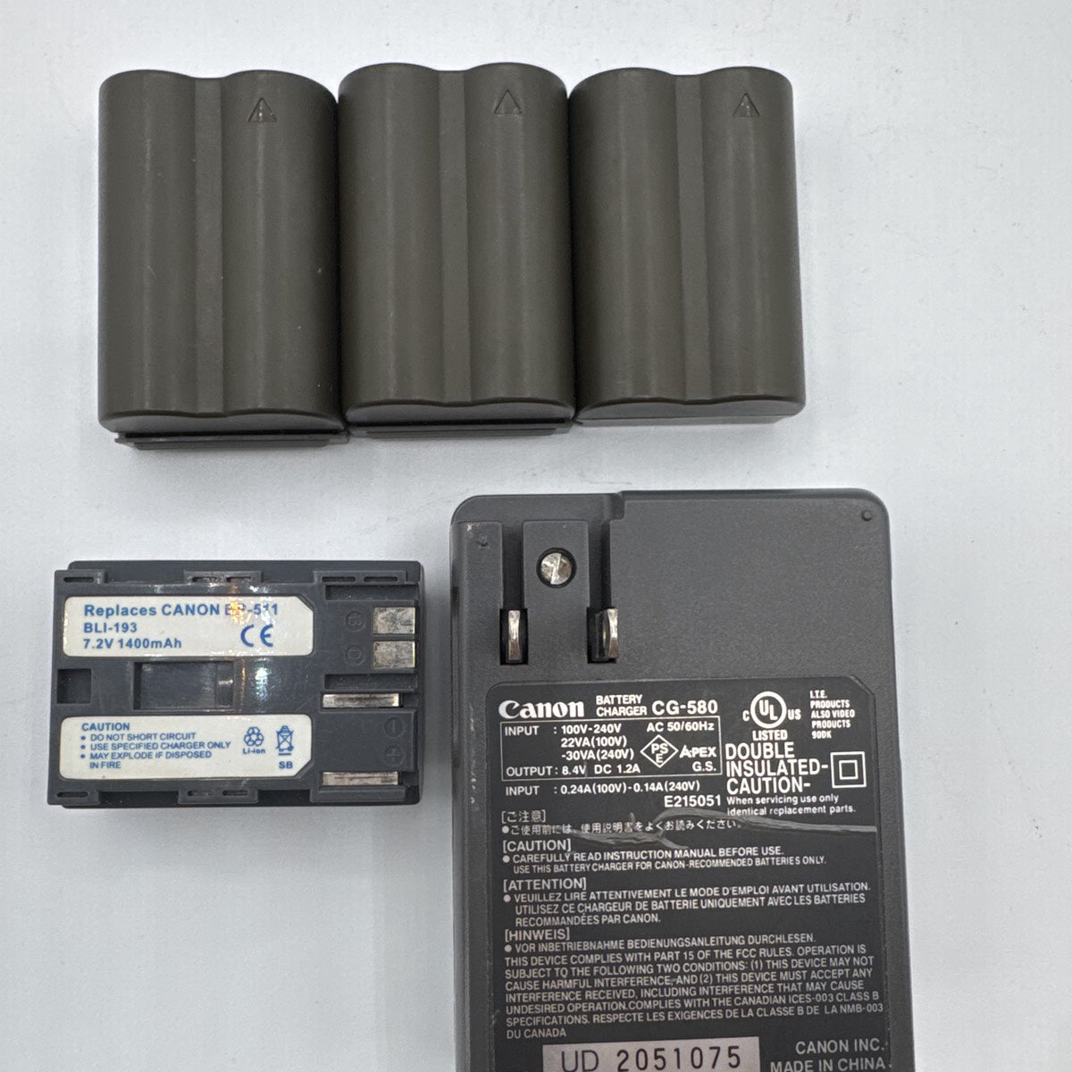 Used Canon Battery Charger CG-580 with BP-511 batteries