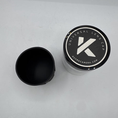 Used KUVRD Universal Lens Cap