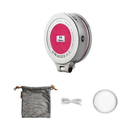 Harlowe Sol 5 XM Bi-Color Mobile Light with silver body, magenta center logo, grey pouch, white cable, and diffuser.